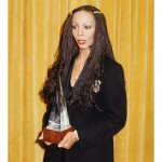 Donna Summer poses holding her American Music Award trophy which she won for Favorite Pop Rock Female Artist on January 18, 1980 in Los Angeles, California.