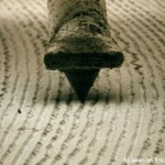 Close-up of a record stylus on the grooves of a vinyl record