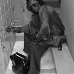 Miles Davis gets into his locker
