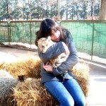 girl-poses-baby-feline