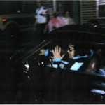 This is a snapshot of Elvis pulling into Graceland with girlfriend Ginger Alden August 16, 1977 after a visit with a dentist.