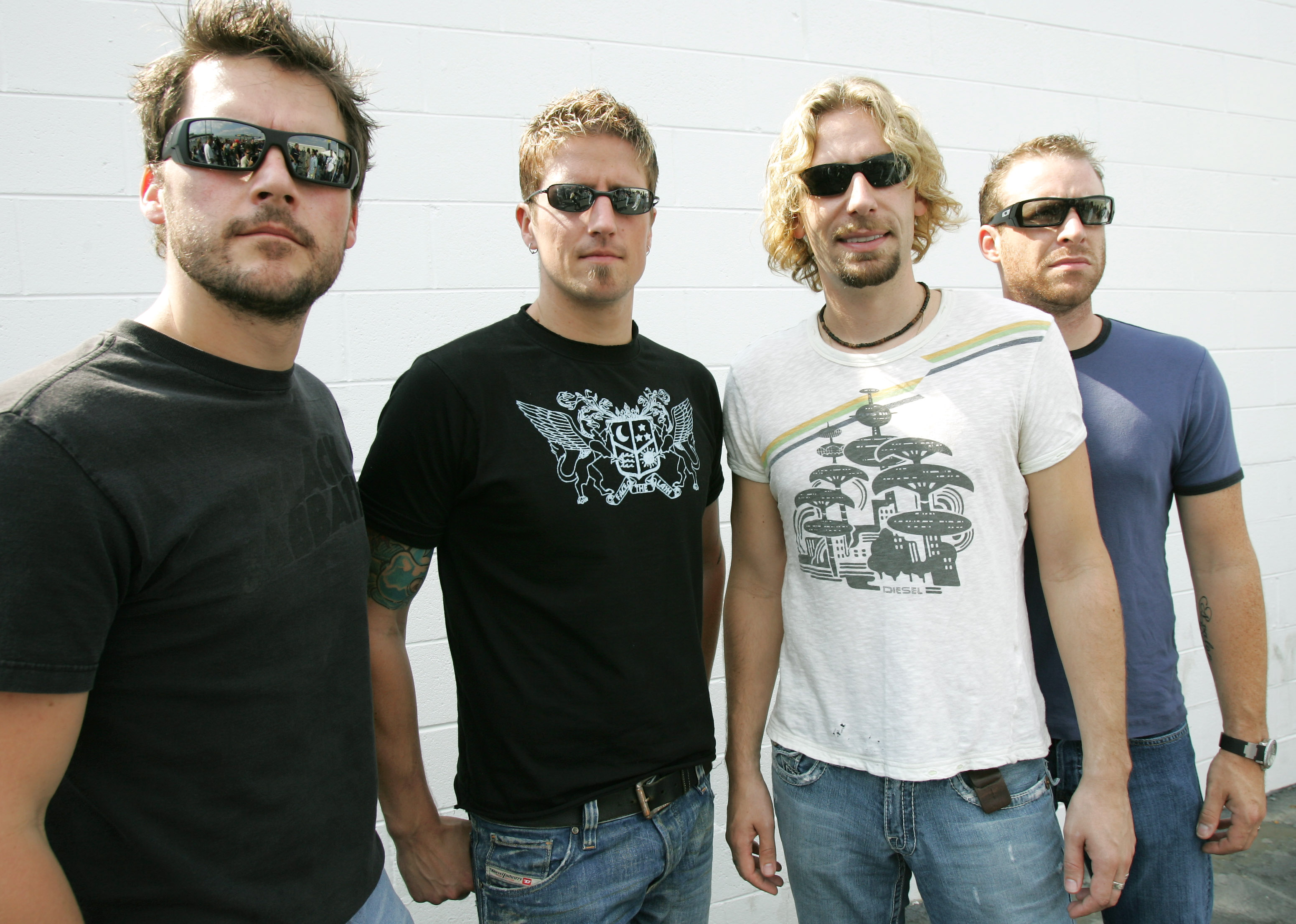 Дайте там группа. Группа никельбэк. Рок группа Nickelback. Канадская рок группа Nickelback. Nickelback фото группы.