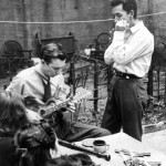 Pete Seeger and Woody Guthrie at Seeger’s wedding, 129 MacDougal Street, 1943.