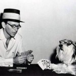 Frank Sinatra playing cards with his dog
