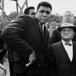 Muhammad Ali being scared by a bee while visiting a movie set in London, 1966.