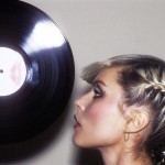 Debbie Harry of Blondie licking the edge of a 12 inch vinyl LP (2)