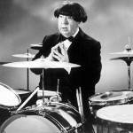 Alfred Hitchcock wearing a Beatle wig, 1964