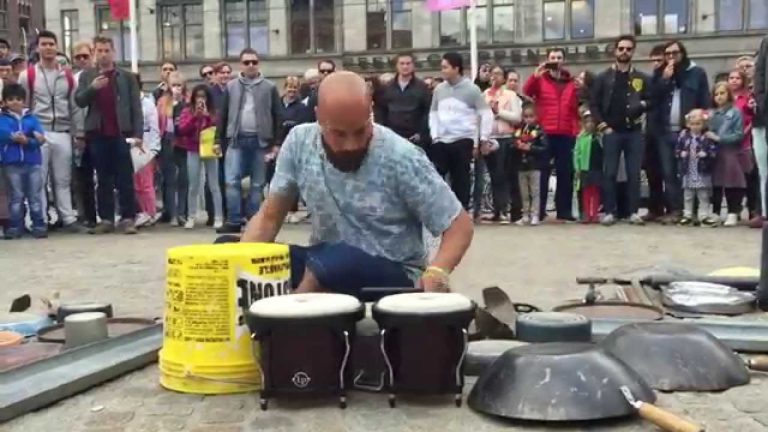 Street Drummer KILLS IT performing on buckets, pots and pans