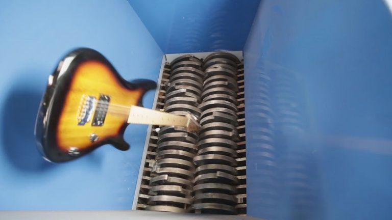 Watch Shredding An Electric Guitar In An Industrial Shredder Being Shred. Shredder.