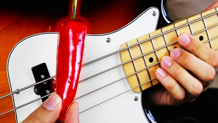 Playing some Red Hot Chili Peppers song using an actual red hot chili pepper… and a bass guitar!