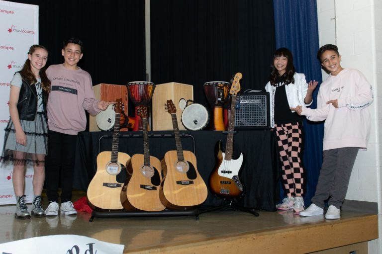 KIDZ BOP And MusiCounts Surprise Toronto School With MusiCounts Band Aid Program Instrument Grant