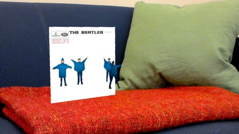 Watch Photos Come To Life By Augmented Reality