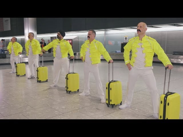 Watch Airport Staff Perform Queen’s ‘I Want to Break Free’