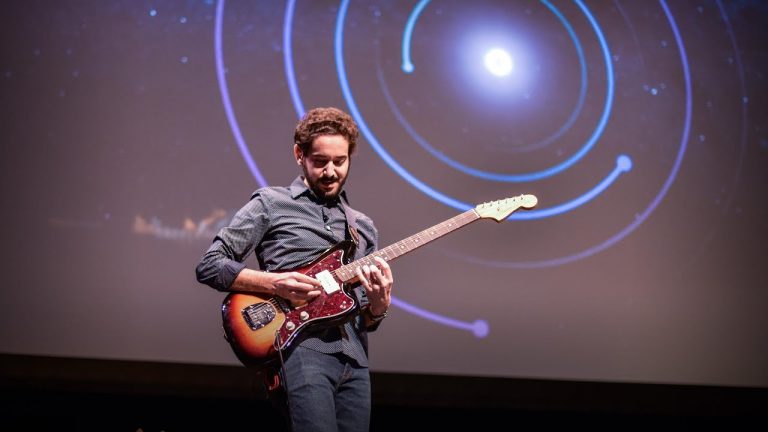 What does the universe sound like? Let a guitar-playing Astrophysicist explain it for you.