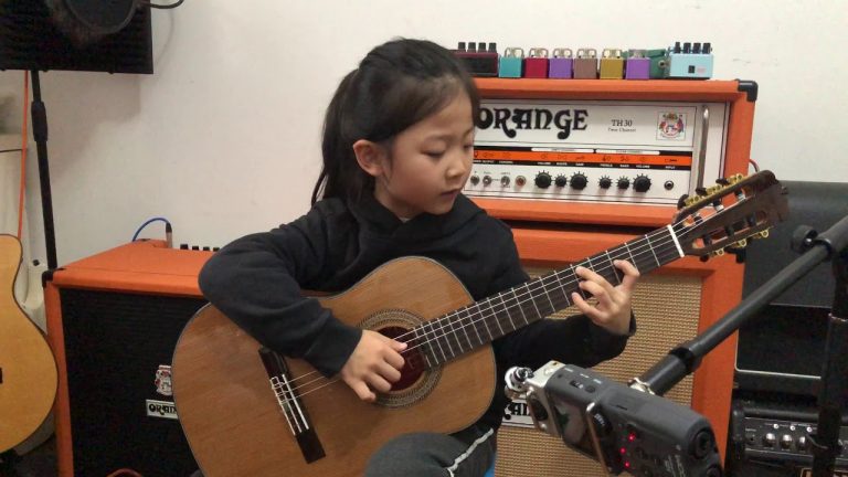 This six-year-old girl is crushing this flawless bossa nova cover of ‘Fly Me To The Moon’ on classical guitar