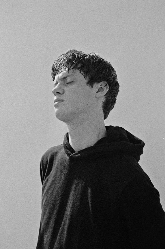 Introducing Alex Frew: The Canadian Newcomer Hopes To “Get Out Alive”