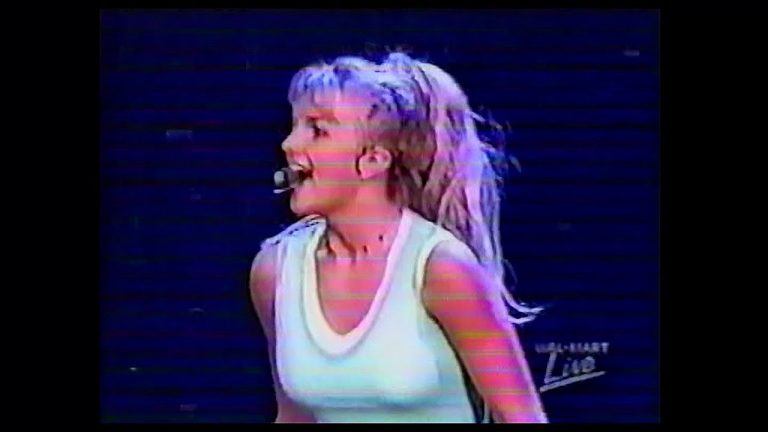 Britney Spears performing a showcase during the Walmart Concert Series, while promoting her debut album in 1999