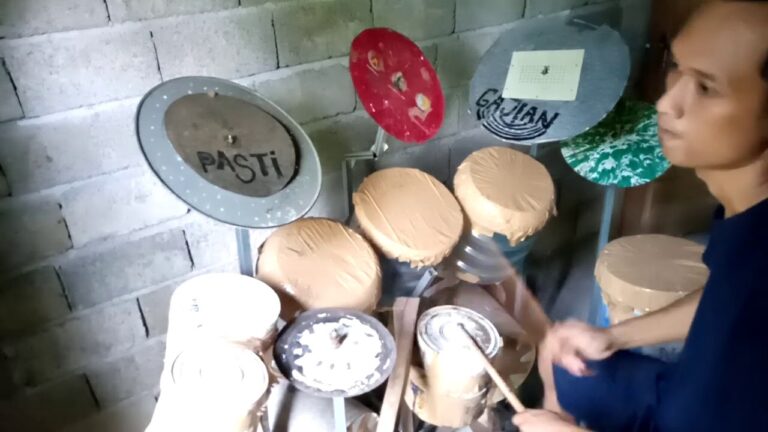 Guy Performs Rush’s “Tom Sawyer” On A Low-Budget Drum Kit And It’s AWESOME