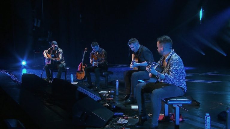 Watch 40 Fingers Cover Dire Straits’ ‘Sultans of Swing’ on Four Guitars