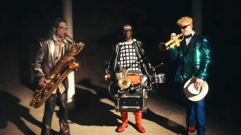 Too Many Zooz Bring Jazz Mayhem to a 1940s Swing Dance Party In “Carvan” Music Video
