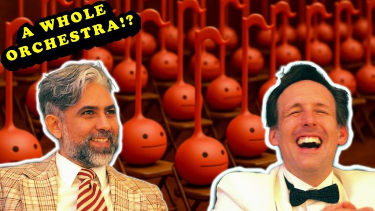 Comedians Andrew Heaton and Justin Robert Young Inspire Record-Breaking Otamatone Orchestra at ‘We’re Not Wrong’