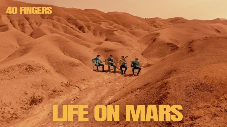 40 Fingers Perform Mesmerizing Four-Guitar Cover Of David Bowie’s “Life On Mars”