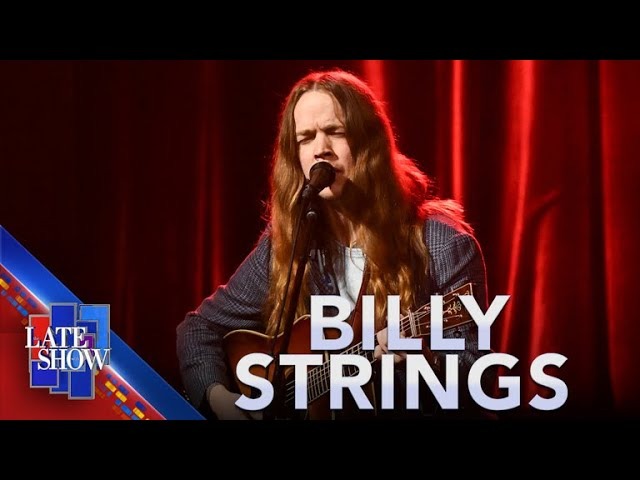 Billy Strings Brings Bluegrass Fire To Colbert With “Leaning On A Travelin’ Song” As His Grammy Momentum Grows