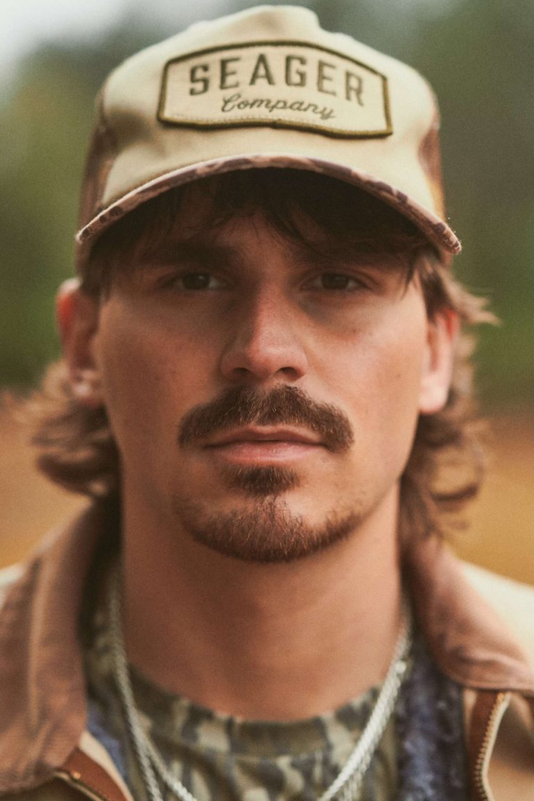 Tucker Wetmore Goes Wild West in Star-Studded “Brunette” Music Video Featuring Hannah Godwin and Joey Graziadei