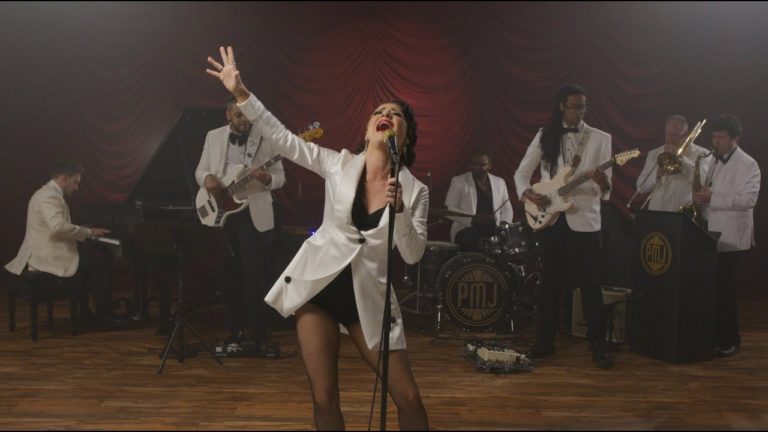 Postmodern Jukebox Taps Kyndle Wylde for 007-Style ‘Barracuda’