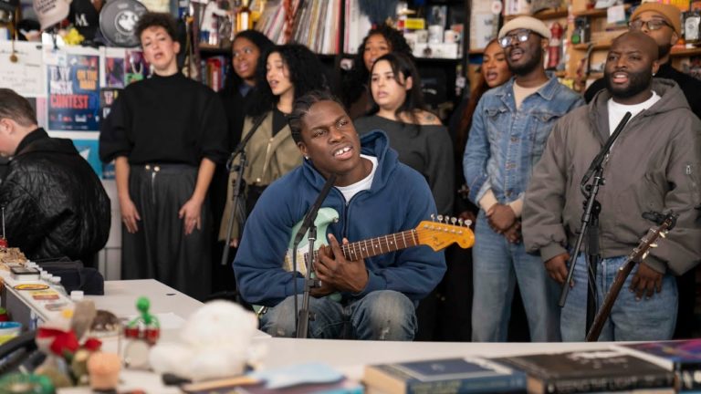 Daniel Caesar Returns To NPR Tiny Desk With ‘Son Of Spergy’ Performance And 12-Piece Choir