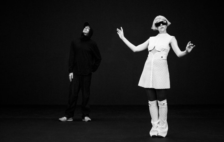 Tom Rowlands Of The Chemical Brothers And AURORA Unmask With “RING THE ALARM”