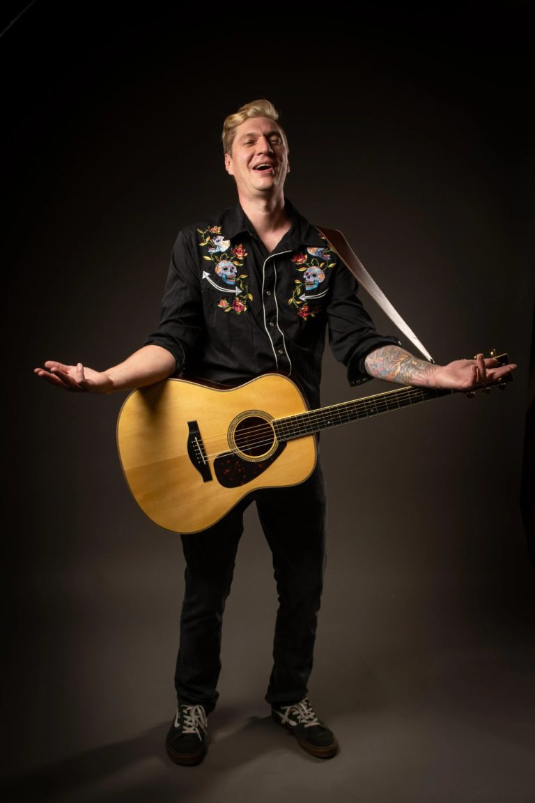 Acoustic Punk Road Scholar Duane Regretzky Swings Hard at AI Art on Blistering Single “Cannibal Integrity”
